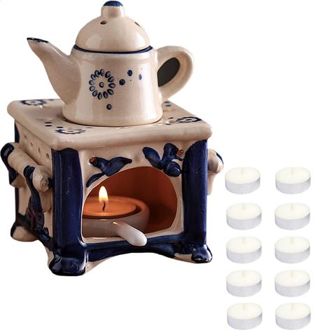 PRICES MAY VARY. HIGH-QUALITY MATERIAL - Our aromatherapy stove is made of high-quality ceramic material, high-temperature firing, hand-painted, exquisite workmanship, delicate texture, and durability EXQUISITE SHAPE - This lovely essential oil stove features a small teapot and stove shape with delicate patterns and beautiful details. Hollow-out design, candle light penetrates the furnace body, which is both ventilated and beautiful. Four-legged base design, more stable placement EASY TO USE - Y Tea Pot Candle Holder, Pottery Candle Lanterns, Tea Candle Cover, Candle Cup Holder, Stove Top Candle Warmer, Handmade Candle Holders Ceramic, Clay Pot Candle Heater, Tooth Fairy Candle Warmer, Hollow Form Ceramics