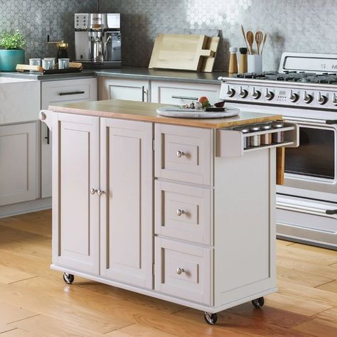 Microwave carts makes storage in the kitchen easier. Here are our favorites so your cart can match your style and fit your needs. White Kitchen Cart, Kitchen Island Trolley, Mobile Kitchen Island, Island Cart, Mobile Kitchen, Kitchen Storage Space, Small Kitchen Island, Kitchen Island Cart, Space Saving Kitchen