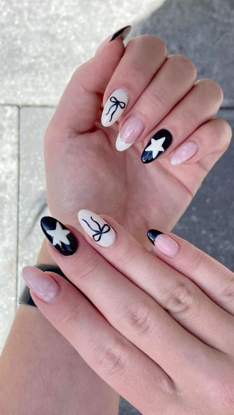 Nails Ribbon Design, Black And White Nails With Stars, Nail Star Ideas, Nail Ideas Blue And Black, Star And Bow Nails, Gracie Abrams Nails Inspired, Black Ribbon Nails, Bow And Star Nails, How To Paint A Star On Nails