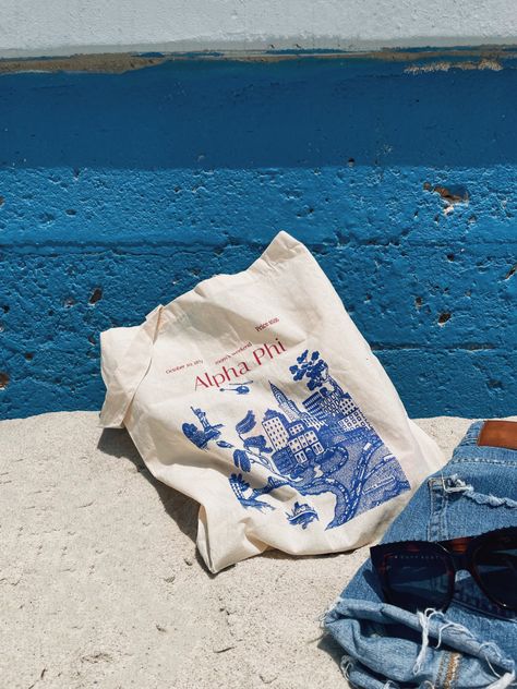 alpha phi tote bag on the beach in san diego #alphaphi #sorority #sandiego #california #totebag #navyblue #denim #shorts #quay #sunglasses #aphi #panhellenic Bid Day Bags, Agd Canvas, Alpha Phi Tote Bag, Junior Posters, Sorority Tote Bags, Initiation Basket, Axo Merch, Fall Merch, Aphi Merch