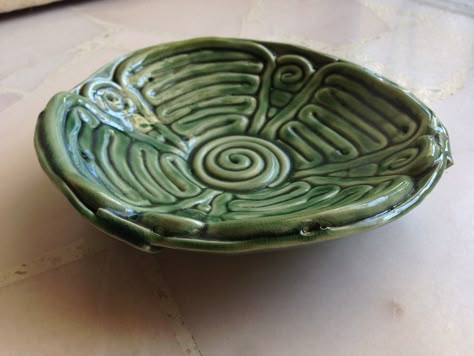 I chose this example of coil pottery because of its shape and possible usage as a dish or plate, differentiating it from the typical pot. I also like how the paint gives it the appearance of a rare or valuable object made from a gemstone such as jade. Coil Plates Ceramics, Coil Bowl Ideas, Clay Coiling, Ceramics Coil, Coil Plate, Coil Bowl, Coil Pot, Bowls Pottery, Native Pottery