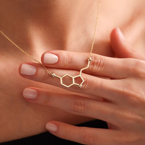 Serotonin Molecule Necklace, Happiness Symbol Necklace, Dopamine Necklace, Science Necklace, Gift For Her #serotoninmoleculenecklace #customnecklaces #serotoninjewelry 🌟 WELCOME TO OUR SPECIAL HANDCRAFTED COLLECTION! Dear Customers, We're thrilled to offer you a unique experience! Are you ready to explore our jewelry pieces, each handmade with love and care? Presenting a collection that epitomizes elegance and beauty... Each piece is a result of our artisans' meticulous craftsmanship. Cra... Chemistry Jewelry, Serotonin Molecule, Molecule Necklace, Text Letters, Science Jewelry, Symbol Necklace, Jewelry Dainty, Dainty Gold Necklace, Medical Students