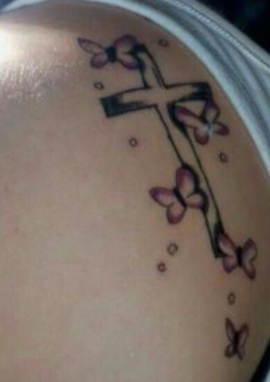 Cross tattoo with purple butterfly Cross With Butterflies Tattoo, Cross With Butterfly Tattoo, Cross And Butterfly Tattoo, Butterfly Cross Tattoo, Grandparents Tattoo, Blue Butterfly Tattoo, Cross Tattoos For Women, Cross Tattoos, Small Pretty Tattoos