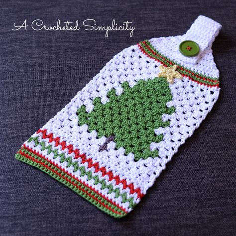 When each holiday rolls around it brings with it the desire to crochet something cheerful & festive to display in my home! Although I love to create designs that are functional (and this one is… Crochet Towel Topper, Crochet Kitchen Towels, Crocheted Christmas, Retro Christmas Tree, Confection Au Crochet, Crochet Xmas, Crochet Towel, Crochet Christmas Trees, Crochet Kitchen