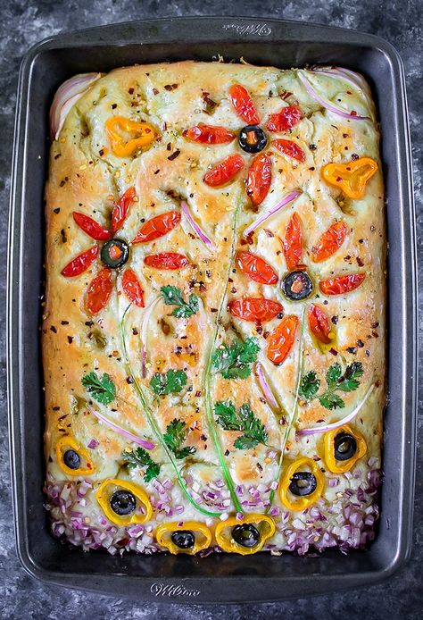 Light and airy Focaccia bread recipe infused with Italian herb seasoning and topped with dried rosemary and olive oil is an absolute crowd-pleaser for your upcoming parties, holidays, or potlucks. #focacciabread #veganbread #veganfocaccia #homemadebreads Foccacia Bread Thanksgiving Art, Faccia Bread Recipes, Focaccia Bread Recipes, Foccia Bread, Vegan Focaccia, Focaccia Recipes, Paratha Roti, Foccacia Recipe, Focaccia Art