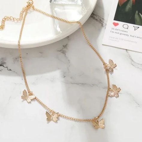 Butterfly Chain ✨🦋 Most Trending Jewelry Item🙌🤌💯 Price 350/- PKR🦋 . . . . . . . PR/64 . #jewelrylovers #fashionaccessories #handmadejewelry #statementjewelry #blingbling #jewelrydesign #gemstonejewelry #luxuryjewelry #instajewelry #shopsmalljewelry #zirconjewelry #pkonlinestore #onlinejewellerypakistan #jewelrypage #necklace #ringsofinstagram #girlsbracelet #ringsforher #earringsofinstagram #zirconearrings #stonejewellery #trendyjewelrypieces #explore #explorepage #fashionforward #jewell... Butterfly Necklace Gold, Necklace Patterns, Butterfly Pendant Necklace, Gold Choker Necklace, Gold Necklace Women, Gold Butterfly, Butterfly Necklace, Gothic Jewelry, Butterfly Pendant