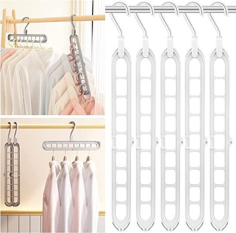 Whether your organizing your closet or cleaning it out, Space Saving hangers are the way to go to create extra space in your closet. Hang several items with just one hanger. It easy, simple, functional and looks great. Organization For Clothes, Neat Closet, Save Closet Space, Closet Clutter, Hanging Wardrobe, Space Saving Hangers, Hanger Organizer, Storage Closet, Dorm Room Essentials