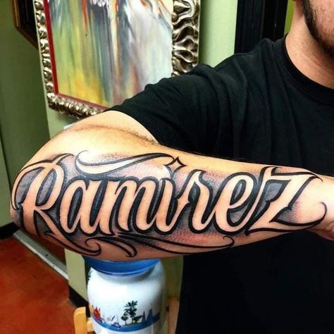 Last Names Tattoos On Arm, Letters For Tattoos Fonts, Shading Around Name Tattoo, Chavez Tattoo Name, Last Name Arm Tattoo, Negative Shading Tattoo Letters, Sanchez Tattoo Last Name, Last Name Tattoos For Men On Back, Last Name Forearm Tattoo Men