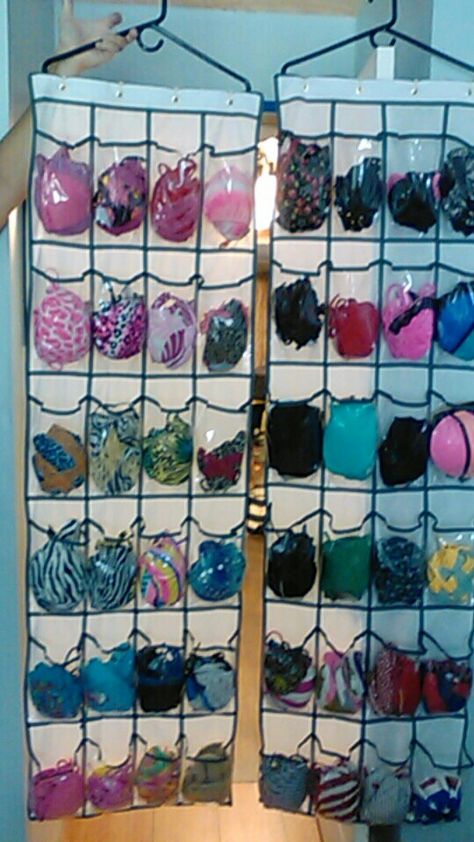 Bikini storage made from shoe organizer.  Those are heavy duty  clothes hangers I zip tied the storage to. Bra Hanger Diy Ideas, Fabric Shoe Organizer, How To Store Bathing Suits In Closet, Bathing Suit Closet Organization, Organize Swimsuits Ideas, Bathing Suit Organization Storage Ideas, Swimsuit Storage, Swimsuit Organization Ideas, Bathing Suit Organization