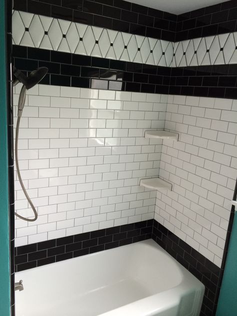 Black and white subway tile, black bullnose trim, and white pillow tile from Tile Expo in Anaheim, grout color is Pewter from Home Depot. Love this bathtub/shower! Black And White Subway Tile Bathroom, Black Tile Around Bathtub, Black Tile Bathtub Surround, White Tub Black Tile, Black And White Tile Tub Surround, White Subway Tile Shower Black Floor, Black And White Bathtub Tile, Burgundy Bathroom, White Tile Shower