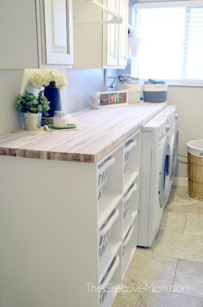 pretty and functional small laundry room with laundry basket shelf and laundry sorter. That butcher block countertop is gorgeous! #themomcreative #laundry #organize Laundry Basket Shelf, Laundry Basket Shelves, Laundry Room Countertop, Laundry Room Decorating, Laundry Room Update, Basket Shelf, Laundry Room Storage Shelves, Room Storage Diy, Laundry Sorter