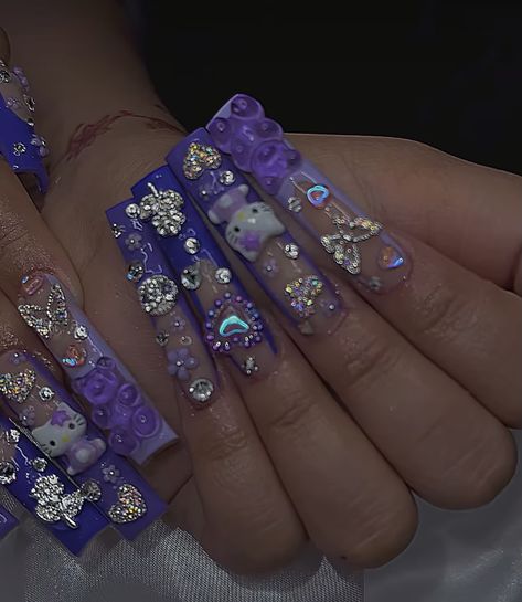 #purplenails #hellokittynails #gemstones #frenchtipnails Purple Hello Kitty Nails, Kuromi Nails Purple, Purple Hello Kitty Nails Acrylic, Kuromi Nails Acrylic Purple, Gemstone Nail Art, Purple Junk Nails, Gemstone Nails, Danny Core, Kuromi Nail Charms