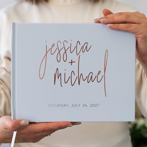 PRICES MAY VARY. 𝑷𝑬𝑹𝑺𝑶𝑵𝑨𝑳𝑰𝒁𝑬𝑫 𝑮𝑼𝑬𝑺𝑻 𝑩𝑶𝑶𝑲: Our guest book for wedding is a beautiful keepsake that encapsulates the love and well-wishes of your nearest and dearest on your special day. This Guest book wedding reception is a blank canvas waiting to be filled with heartfelt messages, advice, and memories shared by those who have witnessed your love story unfold. 𝑪𝑼𝑺𝑻𝑶𝑴𝑰𝒁𝑨𝑩𝑳𝑬 𝑶𝑷𝑻𝑰𝑶𝑵𝑺: With its customizable cover, premium materials, and carefully crafted pages Wedding Signing Book, Signs For Wedding, Polaroid Guest Book, Custom Guest Book, Engagement Gifts For Her, Personalised Guest Book, Personalized Wedding Guest Book, Wedding Guest Book Sign, Reception Signs