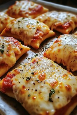 If you're looking for the ultimate comfort food, these Homemade Cheesy Pizza Pockets are a must-try! With a golden, crispy crust, a gooey, cheesy center, and your favorite toppings inside, they're perfect for a quick meal or snack. Whether you're hosting a family dinner or just craving a cheesy treat, pizza pockets are a hit for all ages! Pizza Pockets With Crescent Rolls, Pizza Pockets Homemade, Pizza Pocket, Cheesy Pizza, Pizza Pockets, Quick Meal, Ultimate Comfort Food, Crescent Rolls, Dish Recipes