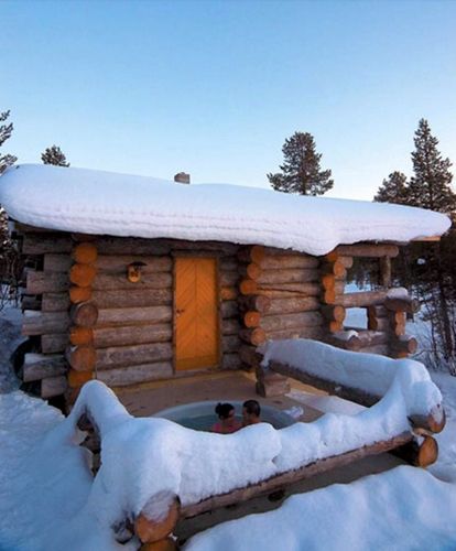 One tip for installing a year-round hot tub? Place it as close to a door to inside as possible. Building onto the side of a rustic log cabin doesn’t hurt either. #style #cottage #cabin #outdoor #hottub #tub #bath #soak Igloo Village, Kakslauttanen Arctic Resort, Cabin Hot Tub, Jacuzzi Outdoor, Earth Homes, See The Northern Lights, Spa Design, Log Cabin Homes, Hot Tub Outdoor