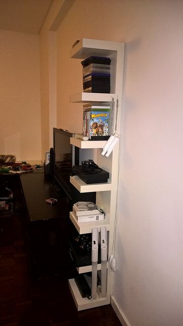 Got this on the opportunities section, at half price. Never quite found the right place for it. Then I remembered to use it as Gaming Consoles Stand. Ps5 Shelf Ideas, Video Game Storage Ideas, Hidden Game Console, Game Storage Ideas, Floating Shelf Under Tv, Lack Wall Shelf, Video Game Storage, Stair Shelves, Ikea Office