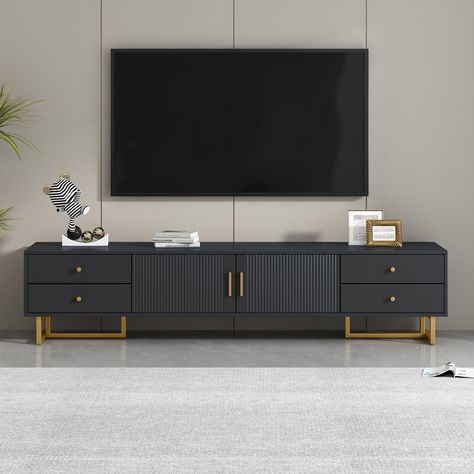 Elevate your living room with this modern TV stand cabinet, featuring a unique wave groove design on the cabinet doors that adds a contemporary touch to your decor. Groove Pattern, Tv Console Cabinet, Tv Console Modern, Black Tv Stand, Media Console Table, Modern Entertainment Center, Tv Console Table, Tv Stand Cabinet, Tv Stand Console