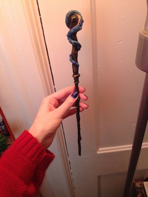 Handmade Kraken wand using polymer clay and acrylic paint Polymer Clay Wands, Polymer Clay Wand, Polymer Clay Witchy Crafts, Harry Potter Diy Wands, Harry Potter Stick, Clay Wand, Easy Clay Ideas, Diy Wands, Wand Designs