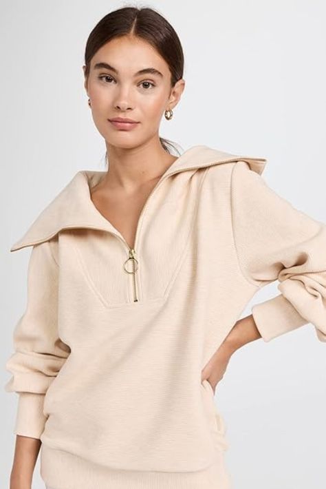 Wrap yourself in warmth and style this season with the exquisite Varley Vine Pullover. Designed for ultimate comfort, it's your go-to choice for chilly days. Elevate your fall and winter wardrobe with this timeless piece that seamlessly blends fashion and coziness. Skirt Swimsuit Coverup, White Jumpsuit Dress, Exaggerated Collar, Exaggerated Sleeves, Activewear Brands, Half Zip Sweatshirt, Half Zip Pullover, China Fashion, Romper Pants