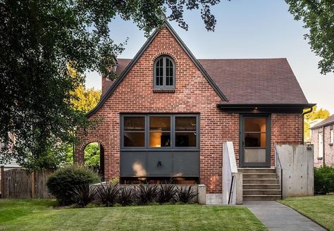 Lane Williams Architects on Instagram: “My own home is a blend of classic 1925 brick Tudor with distinctly modern touches like the concrete porch and sunken courtyard.…” Old Brick House Remodel, Modern Victorian Farmhouse Exterior, Brick And Trim Color Combinations, Modern Tudor House Exterior Red Brick, Brick House Modern Exterior, Red Brick Tudor Exterior, Brick House Addition, Brick Tudor Exterior, Red Brick Home Exterior