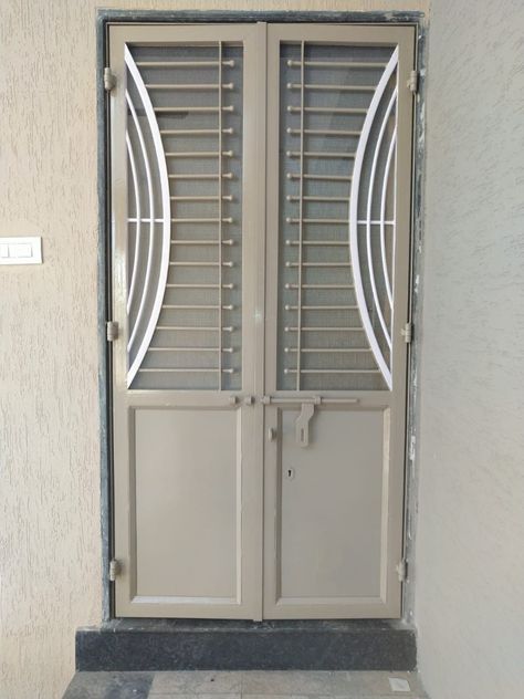 Sefty Door Design Entrance Metal, Metal Safety Door Design, Safety Door Design Entrance Grill, Safety Door Design Entrance, Safety Door Design, Door Design Entrance, Steel Grill Design, Iron Furniture Design, Door And Window Design