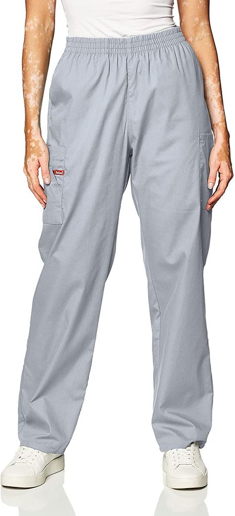 55% Cotton, 45% Polyester
Imported
Pull On closure
Machine Wash
Tapered-leg pant featuring pull-on styling with elastic waistband
Slash pockets and cargo pockets with stretch knit interior pocket
Logo twill tape at inside of back waistband
Instrument loop on right cargo pocket
Modern classic fit with natural rise
Inseam: 30 1/2" Dickies Scrub Pants, Ceil Blue Scrubs, Scrubs For Women, Cargo Pants For Women, White Scrubs, Dickies Scrubs, Dickies Women, Blue Scrubs, Cargo Pants Women