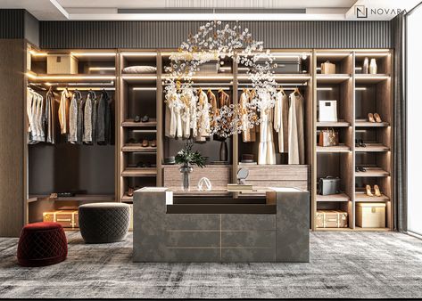 Novara team designed a dressing room in wooden colors that is comfortable for the eye and has a practical and elegant design through the attractive chandelier in its shape, which flattened the dressing room to add a charming light that highlights the harmony of the materials used and reflects the beauty of the middle table. 💻: www.novarainteriors.com #interiordesigner #interiors #stylist #walkincloset #office #love #trendy #cabinet #styling #wardrobes #stylish Dressing Room Table, Cabinet Styling, Modern Dressing Room, Middle Table, Dressing Rooms, Closet Designs, Walk In Closet, Room Designs, Dressing Room