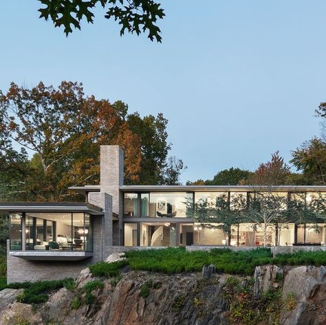 Steven Harris Architects on Instagram: "Our Bedford Quarry House in September. The home’s foundations are set deep into the rock. Because blasting was forbidden onsite, the foundations were excavated using much more labor-intensive measures -- and yet, the finished building sits in the landscape almost effortlessly. Keep an eye out for an exciting new feature of this home coming soon. Project featured in @interiordesignmag Best of Year 2023. Landscape by @reesrobertspartners Image by Scott Fra Bedford Quarry House, Quarry House, 2023 Landscape, Falling Water House, Construction Fails, Rock Quarries, Cliff House, Phoenix Homes, Unique Architecture