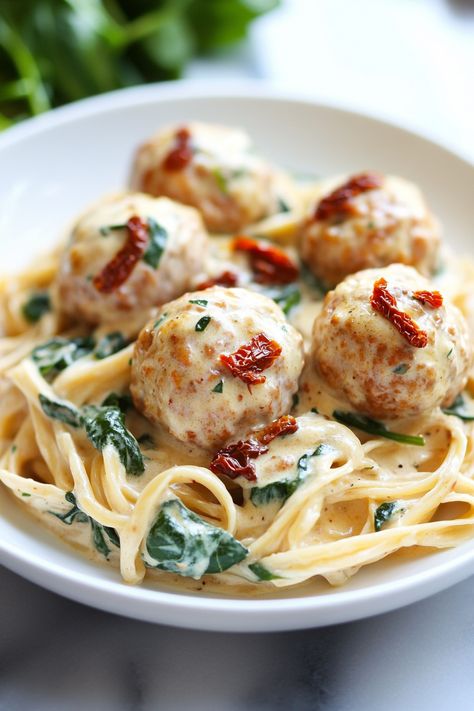 Baked Chicken Ricotta Meatballs with Spinach Alfredo Sauce - Taste Of Recipe Chicken Ricotta Meatballs, Spinach Alfredo Sauce, Meatballs With Spinach, Chicken Ricotta, Ricotta Meatballs, Spinach Alfredo, High Protein Low Carb Recipes, Alfredo Recipe, Creamy Spinach