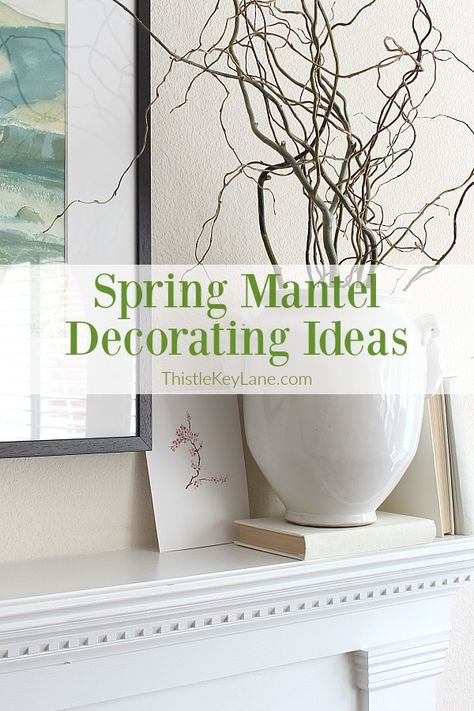 Early Spring Mantel Decorating Ideas - decorate with elements of tall branches, rustic wood, white pottery, green plants and watercolors for spring mantel. #springdecor #springdecorating #springmantel #springmantelwithcurlywillow #decoratingwithplants #springwatercolors Mantel Plants Decorating Ideas, Fireplace Spring Decorating Ideas, Spring Decor Fireplace Mantels, Spring Hearth Decorating Ideas, Spring Mantles Ideas, Early Spring Decorating Ideas, Spring Mantels Decorated, White Mantel Decorating Ideas, Spring Mantle Ideas