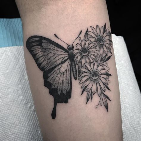 Half Butterfly Half Daisy Tattoo, Daisy Tattoo With Butterfly, Daisy Butterfly Tattoo Designs, Butterfly Tattoo With Daisies, Lillies And Butterfly Tattoo, Daisy And Butterfly Tattoo, Daisy Tattoo Meaning, Daisy And Butterfly, Butterfly Thigh Tattoo