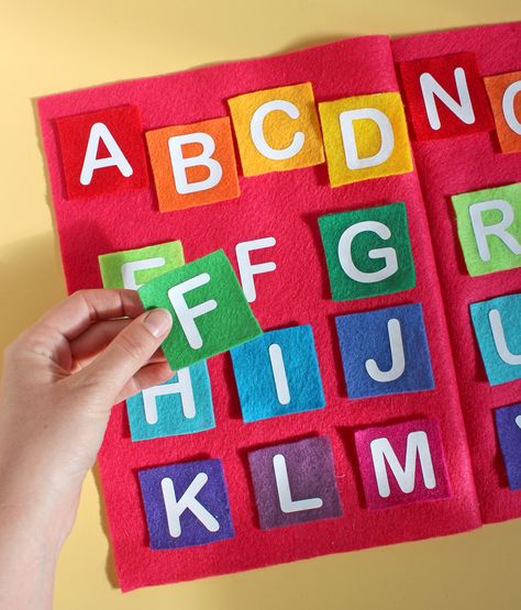 Make a darling felt book alphabet matching game for preschool aged kids using craft felt and heat transfer vinyl from Expressions Vinyl. Quiet Book Preschool, Felt Matching Game, Quite Book Ideas, Felt Alphabet Letters, Alphabet Matching Game, Felt Activity Book, Felt Busy Book, Felt Alphabet, Diy Busy Books