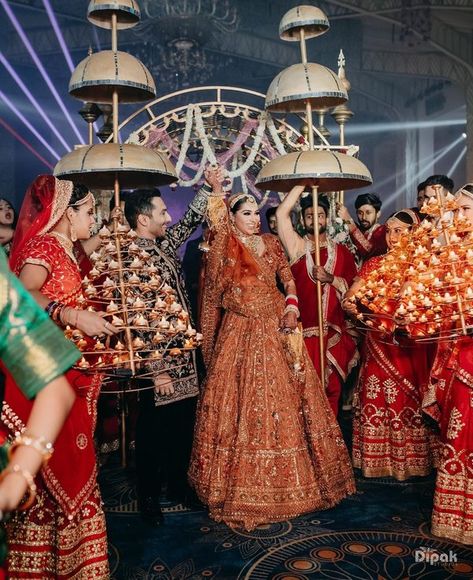 Skip the pastels & Try Fuschia Pink, Burnt Orange & Other Unique Colours For Bridal Lehengas | WeddingBazaar Orange Indian Wedding Dress, Pria Beniwal, Milind Gaba, Millind Gaba, Orange Lehenga, Burnt Orange Weddings, Lehenga Red, Delhi Wedding