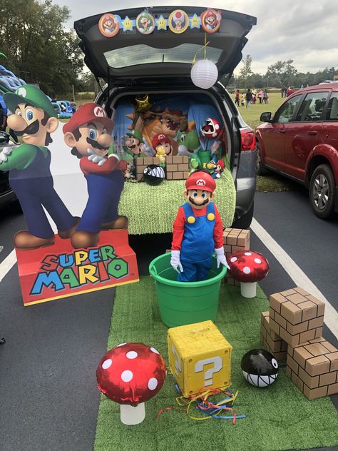 Super Mario Bros Trunk Or Treat Diy, Super Mario Themed Trunk Or Treat, Super Mario Cart Trunk Or Treat, Mario Cart Halloween Wagon, Mario World Trunk Or Treat, Mario Trick Or Trunk, Super Mario Yard Decorations, Super Mario Bros Halloween Costumes Family, Mario Halloween Trunk Or Treat