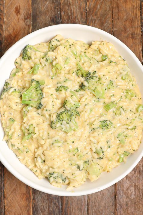 Cheesy Broccoli Rice Broccoli Cheese Rice Instant Pot, Creamy Rice And Broccoli, Cheesy Rice And Broccoli, Cheesey Broccoli, Broccoli Cheddar Rice, Cheesy Rice Recipes, Cheddar Broccoli Rice, Broccoli Cheese Rice, Cheesy Broccoli Rice Casserole