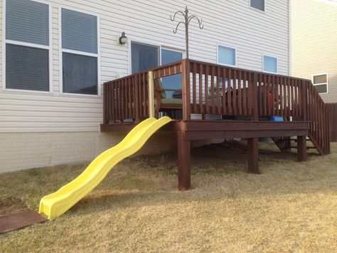 play structure on sloped yard - Yahoo Search Results Slide Off Porch, Deck With A Slide, Slide On Deck, Under Deck Play Area Kids, Slide Off Of Deck, Slide Off Deck, Play Set Landscaping, Deck With Slide, Deck Playground