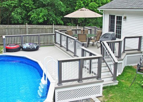 12'x24' Oval above ground pool with decked porch entry and gate Above Ground Pool With Deck, Brown Umbrella, Pool With Deck, Oval Above Ground Pools, Swimming Pool Heaters, White Pool, Deck And Patio, Living Pool, Umbrella Design