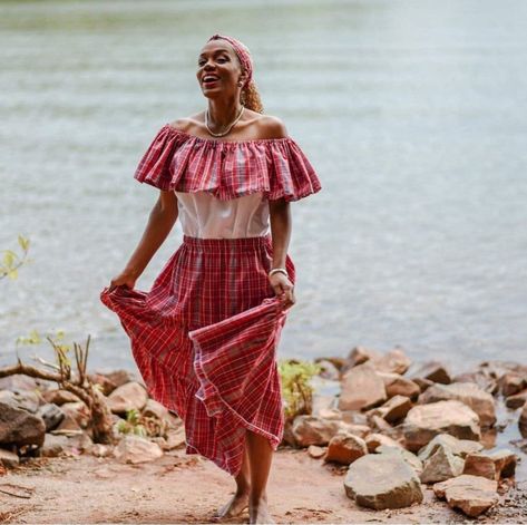 Jamaican adult bandana traditional skirt set with sash/head tie The white peasant blouse with bandana sleeves complements the tiered elastic waist skirt.  The bandana material is imported from Jamaica but the outfit is made in the USA. Pattern placement may vary. Girls outfit here: https://www.etsy.com/AckeeTreeClothing/listing/291885079/jamaican-bandana-skirt-set-traditional Skirt and head wrap only here: https://www.etsy.com/AckeeTreeClothing/listing/609489020/jamaican-bandana-skirt-with-head-wrap Add a matching bow tie  https://www.etsy.com/AckeeTreeClothing/listing/716570793/jamaican-bandana-bow-tie-mens-bow-tie Outfit suitable for Jamaica's nations like Heroes Day, Jamaican Independence Day or International Day. The seams of both the the skirt and blouse are professionally finished wi Jamaican Bandana Outfits, Jamaica Traditional Clothing, Jamaican Traditional Clothing, Dance Group Outfits, Skirt Church Outfit, Jamaica Outfit, Jamaican Dress, Jamaican Clothing, Bandana Skirt