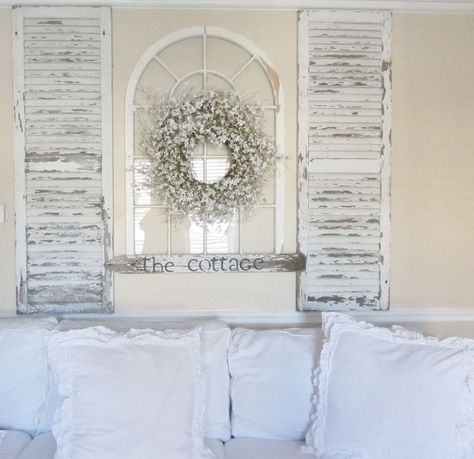 Old shutters in cottage living room with a shabby chic look Shutter Headboard, Country Chic Living Room, Salons Cottage, Camera Shabby Chic, Junk Chic Cottage, Shutter Decor, Shabby Chic Decor Living Room, Vintage Shutters, Vintage Bedroom Decor