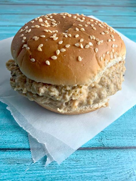 Crockpot Ohio Shredded Chicken Sandwiches are the delicious sandwich we used to order at the baseball field snack shack. Hot, creamy, shredded chicken piled on a soft hamburger bun... the perfect easy meal for your family or to feed a crowd!  #shreddedchicken #chickensandwich #tailgate Ohio Shredded Chicken Sandwiches, Ohio Shredded Chicken, Creamy Shredded Chicken, Shredded Chicken Sandwiches, Shredded Chicken Crockpot, Chicken Sandwich Recipe, Hot Chicken Sandwiches, Recipe With Cream Cheese, Snack Stand