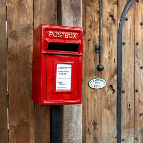 TRADITIONAL RED CAST IRON POST BOX WITH STAND DESCRIPTION This charming red post box is designed with a real sense of tradition. Painted in classic post office red it also has golden raised lettering embossed in the foreground. Built to last, it doesn't just look good, it feels good too. Constructed with a cast iron front and fixed onto a thick steel box. The paint has been powder coated to offer the best protection against the elements.  For security and peace of mind a strong efficient lock wi Post Boxes, Old Post Office, Wooden Posts, Metal Floor, Post Box, Letter Box, Diy Box, Birdhouse, Mailbox