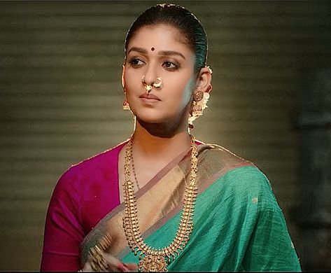 Nayanthara Mookuthi Amman 2020 (Green and Pink Silk Saree) Mukuthi Amman Nayanthara, Nayanthara Mookuthi Amman, Mookuthi Amman, Pink Silk Saree, Double Piercing, Simple Clothing, Half Saree Designs, Saree Blouses, Silk Saree Blouse