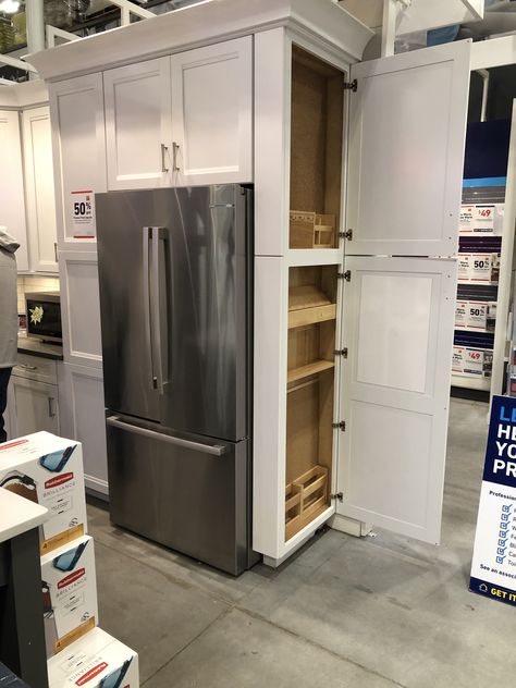 Island Off Wall Kitchen, Food Storage In Cabinets, Tall Cabinet Beside Fridge, Free Standing Fridge Freezer In Kitchen, Cabinetry Around Refrigerator, Shelves Around Fridge, Fridge And Stove On Same Wall, Refrigerator Surround Cabinets, Fridge Next To Wall