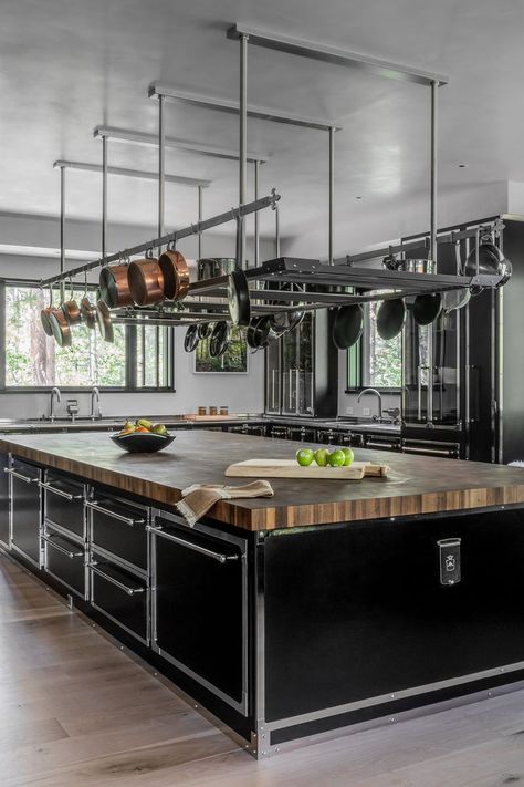 Embrace the rustic glam style with this tailor-made kitchen in Aspen. Featuring a striking black and chrome palette, this project embodies the perfect harmony of rustic charm and modern elegance. Split Level Home Designs, Dark Kitchen Ideas, Officine Gullo, Commercial Kitchen Design, Barn Kitchen, Modern Kitchen Cabinet Design, Dark Kitchen, Rustic Glam, Custom Kitchens