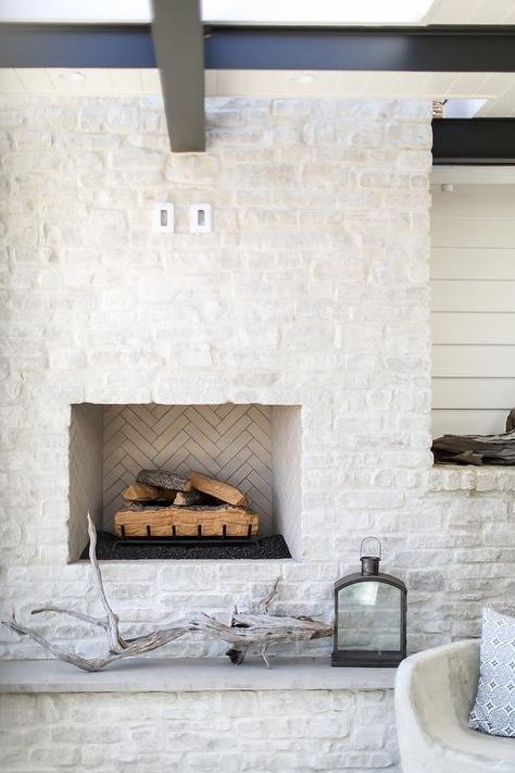 White Brick Fireplace and Hearth - Cottage - Deck/patio Coastal Brick Fireplace, Austin Stone Fireplace, Blue Powder Rooms, Cottage Deck, Black And White Sofa, Melanie Turner Interiors, Solar System Wallpaper, Austin Stone, Beach Style Bedroom