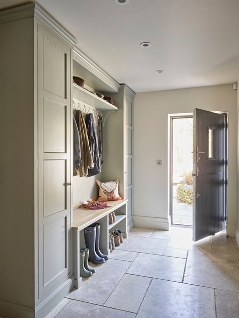 We can’t predict the weekend weather, but we can recommend a boot room. You don’t have to live in a mansion to create a space that keeps muddy wellies, coats and the kids’ shows neat and tidy and the rest of the house clean.⁠ This fabulous boot room features bespoke cabinetry with walnut wood details by #thesecretdrawer, is finished in #blueblood from @paintandpaperlibrary and a reclaimed slate floor. ⁠ ⁠ 📸 | @nickyarsley ⁠ Oak Bench Seat, Boot Room Utility, Natural Stone Floor, Hallway Seating, Utility Room Designs, Mud Room Entry, Large Hallway, Mudroom Laundry Room, Mudroom Decor