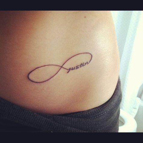 infinity symbol with my son's name within it Sons Name Tattoo Ideas For Men, Justin Name Tattoos, Justin Tattoo Name, Tattoo Ideas For Sons Name, Infitiny Tattoo With Name, Justin Name, Sons Name Tattoos, Infinity Symbol Tattoo With Names, Tattoo With Names