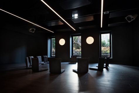 Yoga poses inspire interiors of Dublin's The Space Between Jedi Meditation, Black Wooden Floor, Black Meditation, Yoga Studio Interior, Concertina Doors, Serene Aesthetic, Relaxing Yoga Poses, Oak Floorboards, Yoga Studio Design