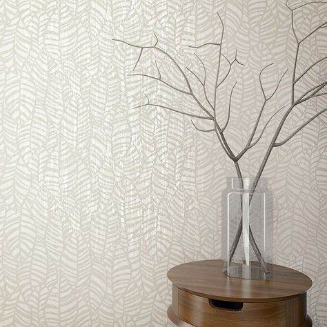 An all over design featuring a scattering of leaf shapes atop one another creating depth and dimension within this semigeometric design. Seen here in the Champagne colourway. Beige Living Room Wallpaper, Guest Bathroom Wallpaper Ideas, Bathroom Wallpaper Accent Wall, Living Room Wallpaper Neutral, Wallpaper Half Bath, Champagne Wallpaper, Organic Wallpaper, Galerie Wallpaper, Taupe Wallpaper