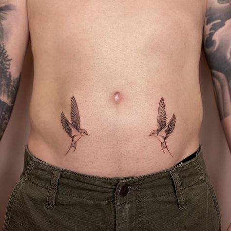 Bird tattoo symmetrical microrealism fineline @veintidos.studio Symmetrical Body Tattoos, Symmetrical Bird Tattoo, Symmetrical Tattoo Back, Bird Tramp Stamp, Symmetrical Piercings, Symmetrical Tattoo Ideas, Symmetrical Collar Bone Tattoo, Bird Back Tattoo, Symmetrical Back Tattoo